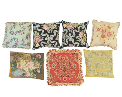 Lot 357 - A floral tapestry cushion with red and gold passementerie.