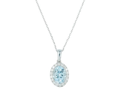 Lot 131 - An 18k white gold oval aquamarine and diamond set cluster pendant, on an 18k chain.