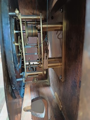 Lot 759 - A rare weight driven torsion wall clock, labelled John Baptiste Rombach.
