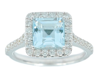 Lot 146 - A 9k white gold square aquamarine and melee diamond set ring.