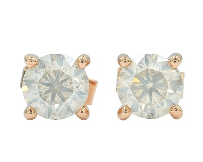 Lot 155 - A pair of 18k rose gold 1.82ct round brilliant cut diamond solitaire ear studs.