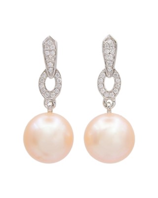 Lot 193 - A pair of cultured peach pearl and diamond set articulated earrings, set in 9k white gold.