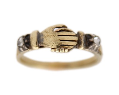 Lot 223 - A rare early 19th-century gold and diamond triple-hoop fede gimmel ring.