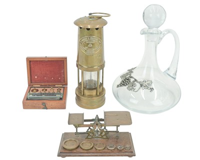 Lot 43 - A brass miner's lamp by E Thomas & Williams Ltd.