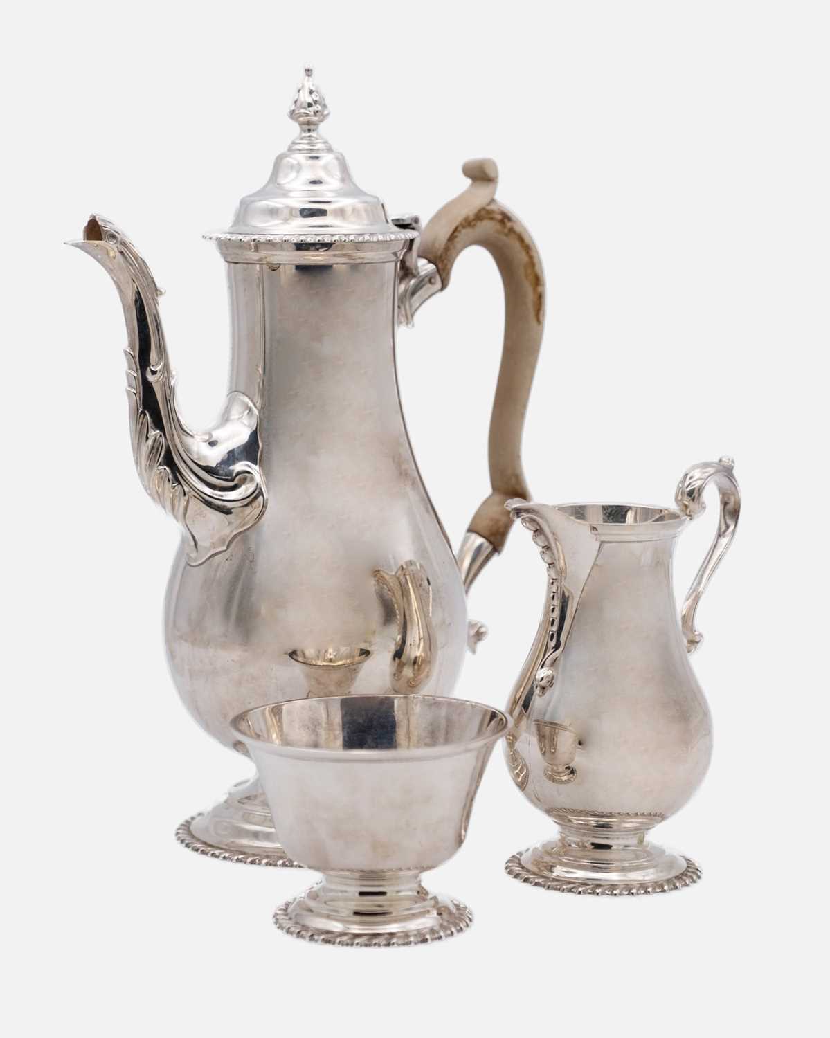 Lot 350 - A modern silver three-piece coffee service by Nayler Brothers.