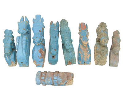 Lot 82 - A collection of Indian horse head carvings.