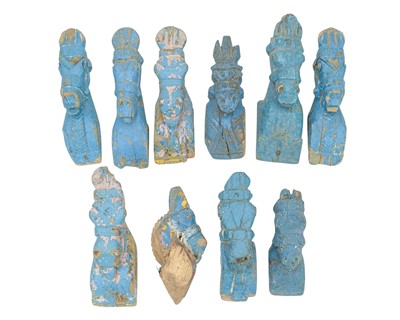 Lot 92 - A collection of Indian horse head carvings.