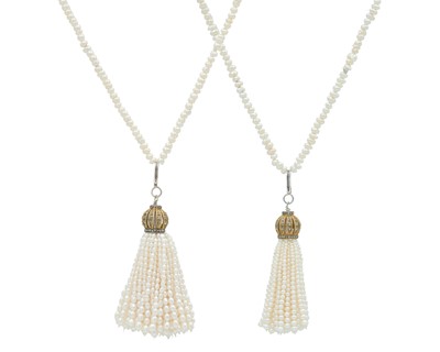 Lot 306 - A pair of silver-gilt diamond-set pearl tassel pendants, each applied to a cultured pearl necklace.