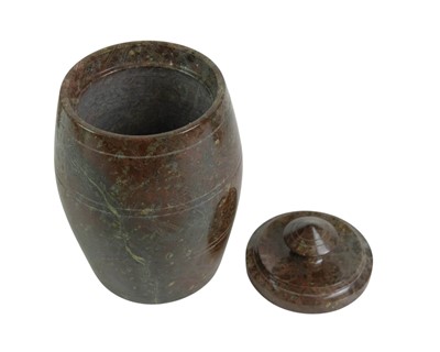 Lot 79 - A turned red Cornish serpentine tobacco jar.
