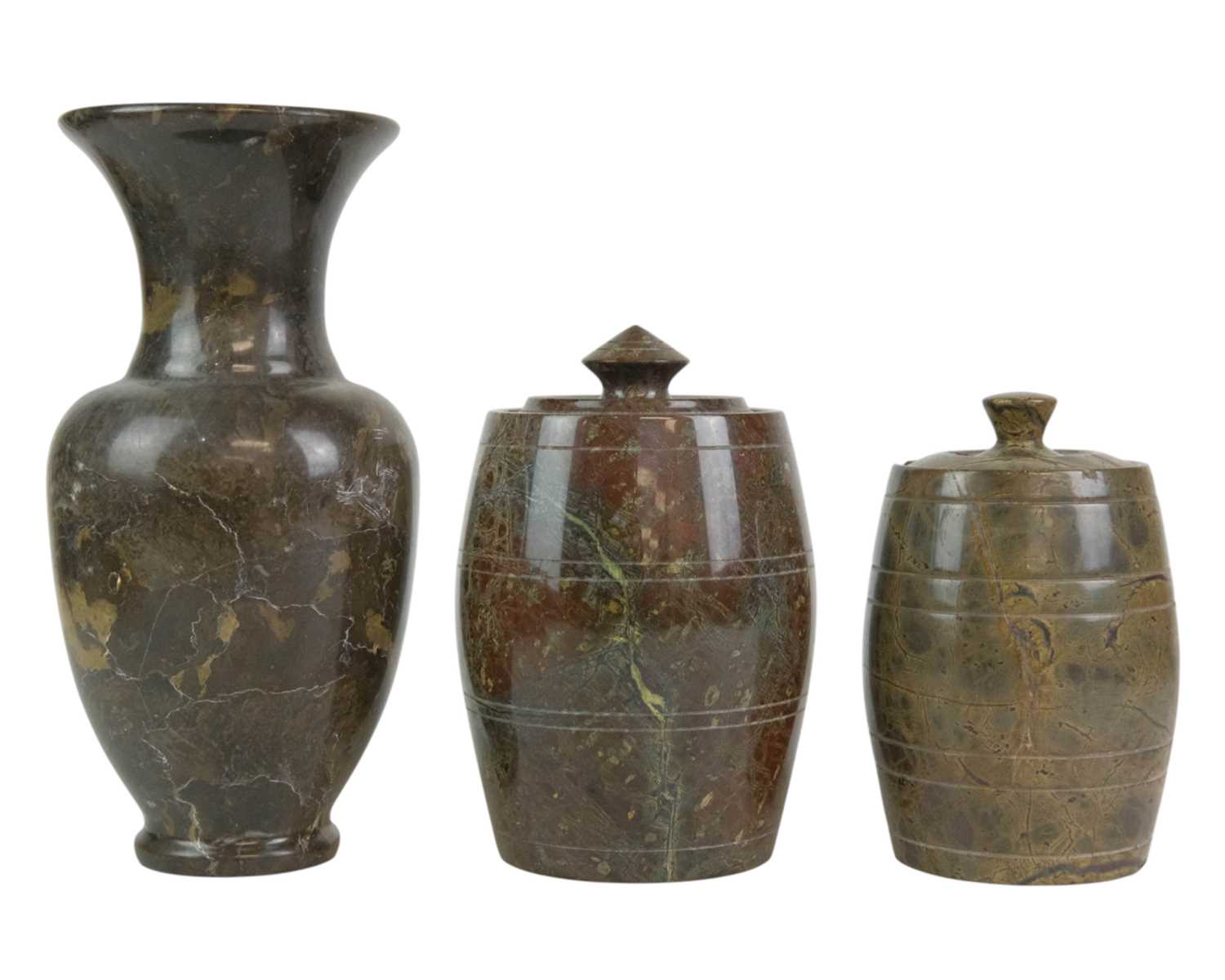 Lot 79 - A turned red Cornish serpentine tobacco jar.