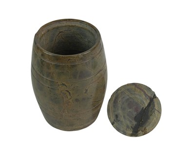 Lot 79 - A turned red Cornish serpentine tobacco jar.