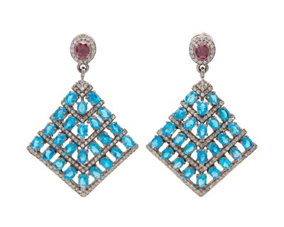 Lot 238 - A pair of flared drop earrings with oval apatites, garnets and diamonds, set in silver.