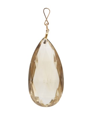 Lot 243 - A briolette-cut citrine pendant with 9k gold bale.