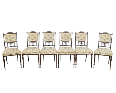 Lot 894 - A set of six Victorian rosewood dining chairs.