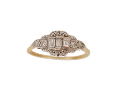 Lot 250 - An Art Deco 18k and platinum diamond set dress ring.
