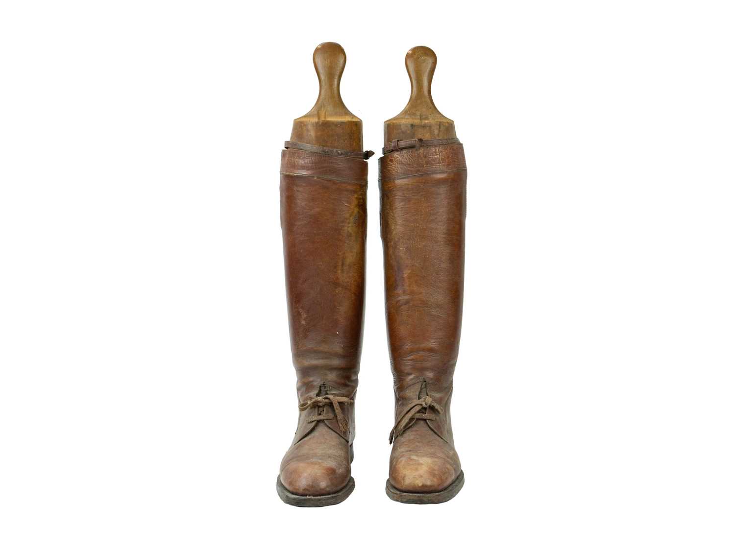 Lot 50 - A pair of brown leather military or riding boots.