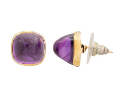 Lot 259 - A pair of gold sugar-loaf amethyst stud earrings.