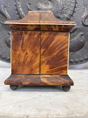 Lot 1 - A Regency tortoiseshell tea caddy.