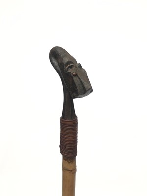 Lot 120 - An unusual walking stick, the iron finial...