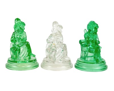 Lot 566 - A pair of late 19th century John Derbyshire press-moulded green glass figures.