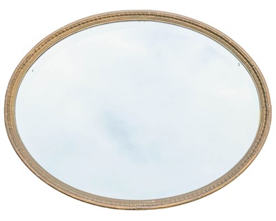 Lot 818 - A Victorian oval gilt wall mirror.