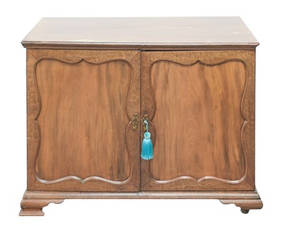 Lot 906 - A George III mahogany side cabinet.