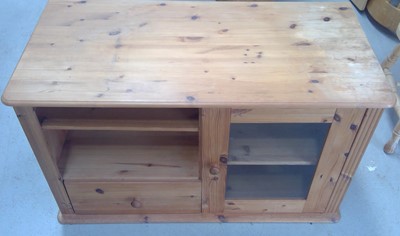 Lot 23 - A Pine Entertainment Stand. 58cm tall, 102cm...