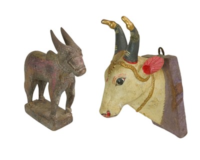 Lot 160 - Two Indian Nandi Bull sculptures.