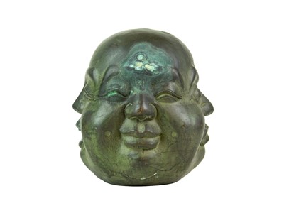 Lot 450 - Four faced brass buddha head.