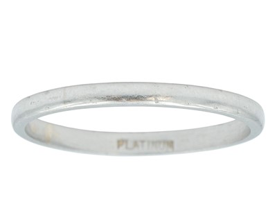 Lot 277 - A platinum thin band ring.