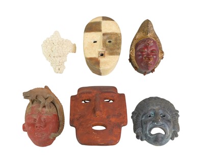 Lot 660 - A collection of masks.