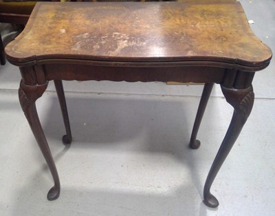 Lot 16 - A Walnut Veneer Swivel Card Table. The Table...