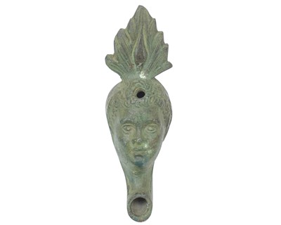 Lot 83 - Four bronze walking cane handles.