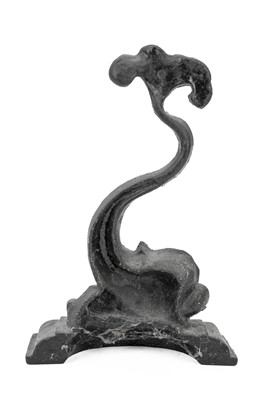Lot 14 - A Victorian black painted cast iron door stop in the form of a stylised dolphin.