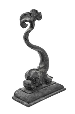 Lot 14 - A Victorian black painted cast iron door stop in the form of a stylised dolphin.