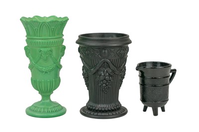 Lot 568 - A 19th century John Derbyshire dark purple press-moulded glass vase.