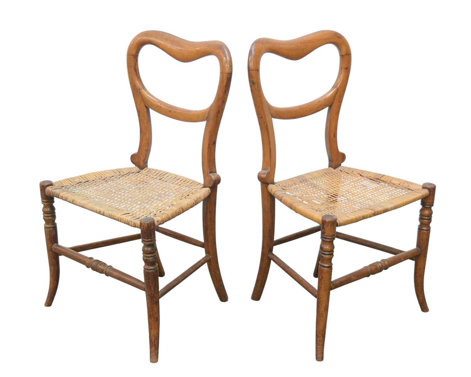 Lot 118 - A pair of Victorian mahogany and cane dish backed child chairs.