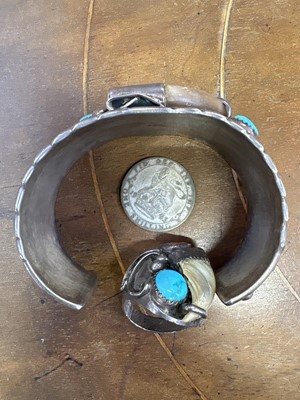 Lot 101 - Navajo sterling silver bangle and ring.