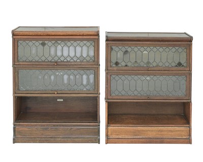 Lot 839 - Two oak Globe Wernicke sectional bookcases.