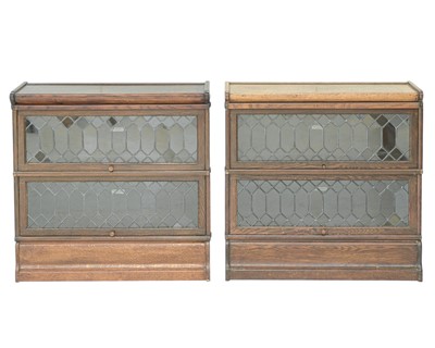 Lot 892 - Two Globe Wernicke oak sectional bookcases.