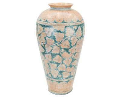 Lot 379 - An Eastern pottery floor vase.