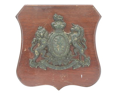 Lot 112 - A Victorian cast brass royal coat of arms.