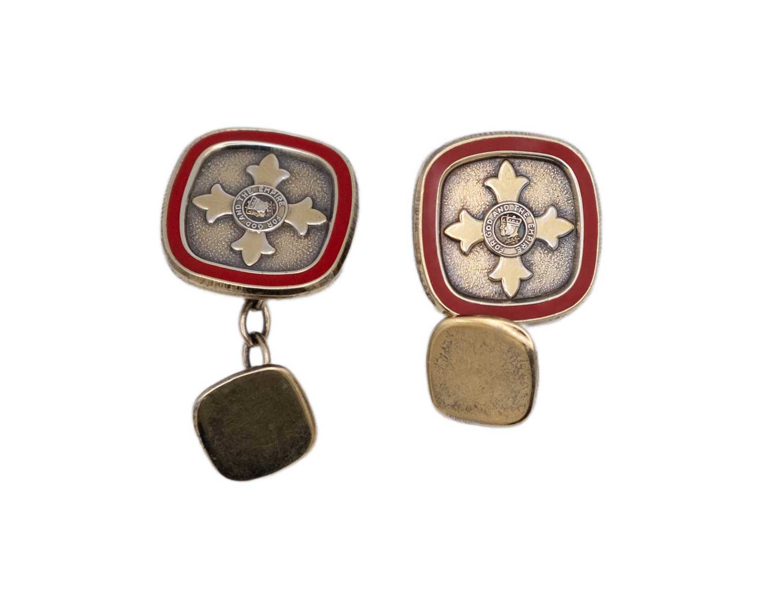 Lot 41 - A pair of sterling silver-gilt red enamel MBE cufflinks, by Toye, Kenning & Spencer Ltd.