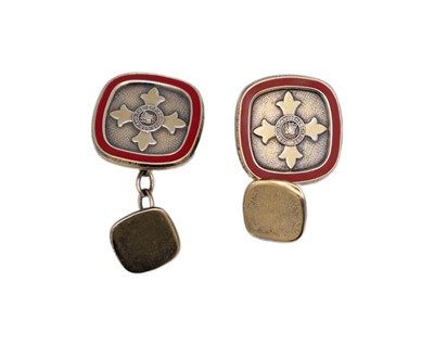 Lot 41 - A pair of sterling silver-gilt red enamel MBE cufflinks, by Toye, Kenning & Spencer Ltd.