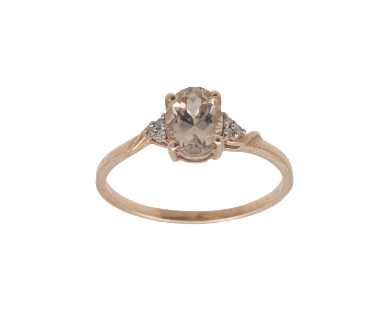 Lot 33 - A 9k diamond and oval Csarite ( Diaspore) set ring by Gemporia.