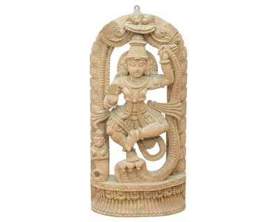 Lot 449 - A carved hardwood sculpture of Lord Vishnu.