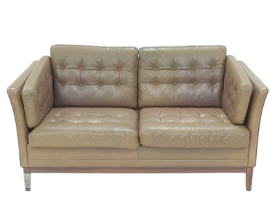 Lot 712 - A Danish two seater leather settee.