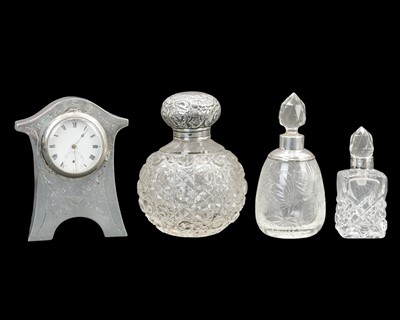 Lot 296 - A George V silver mounted boudoir timepiece.