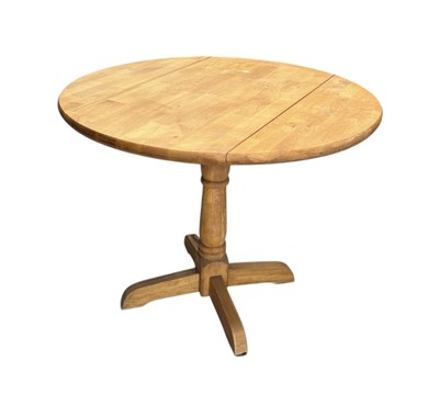 Lot 98 - A hardwood drop-leaf pedestal table. 74cm tall,...