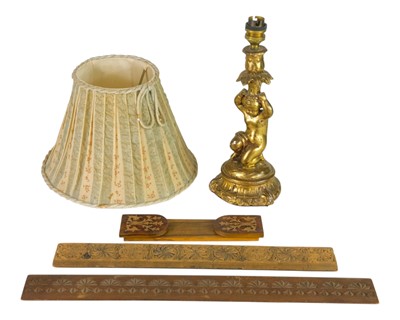 Lot 86 - A gilded table lamp base modelled as a kneeling cherub, with handmade floral shade.